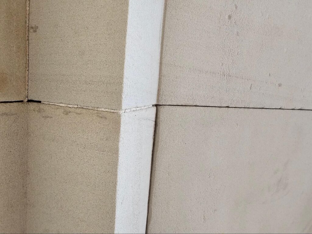 importance of repointing stone facade skin panels
