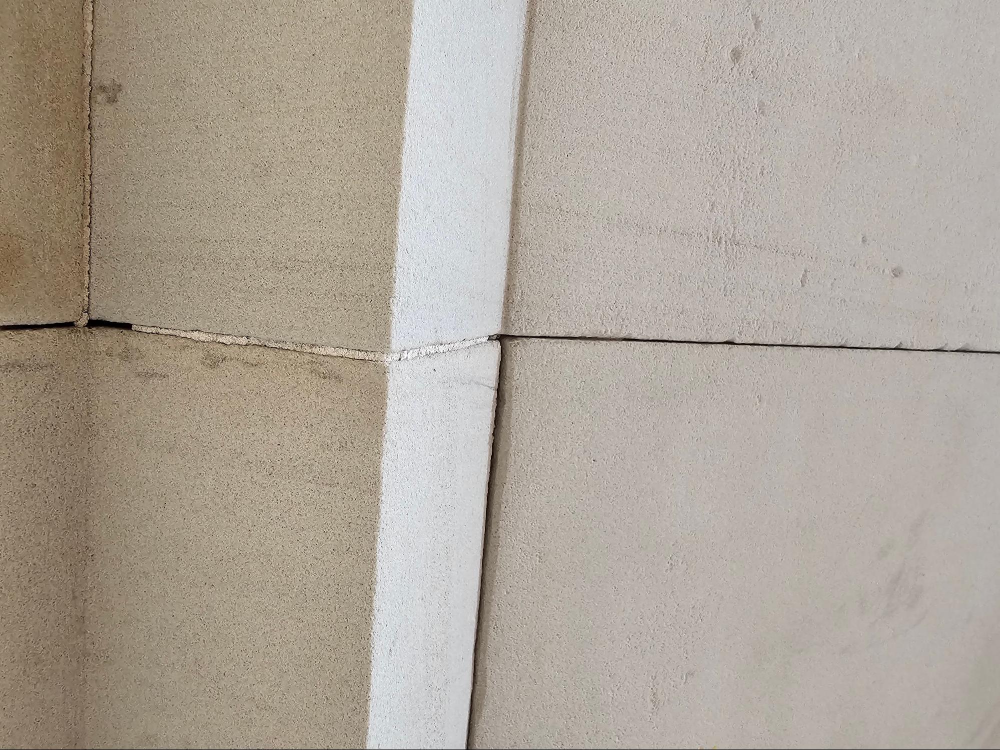 importance of repointing stone facade skin panels
