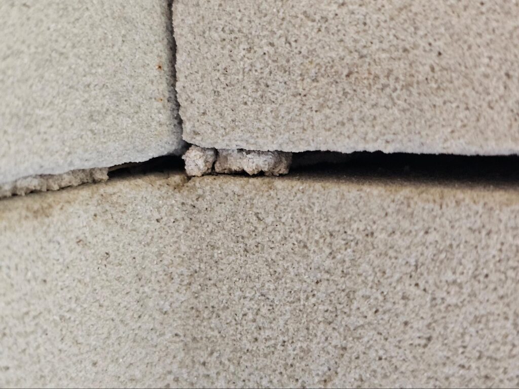 repointing stone facade skin panels
