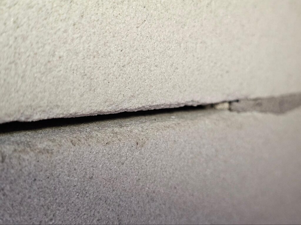 value of repointing stone facade skin panels