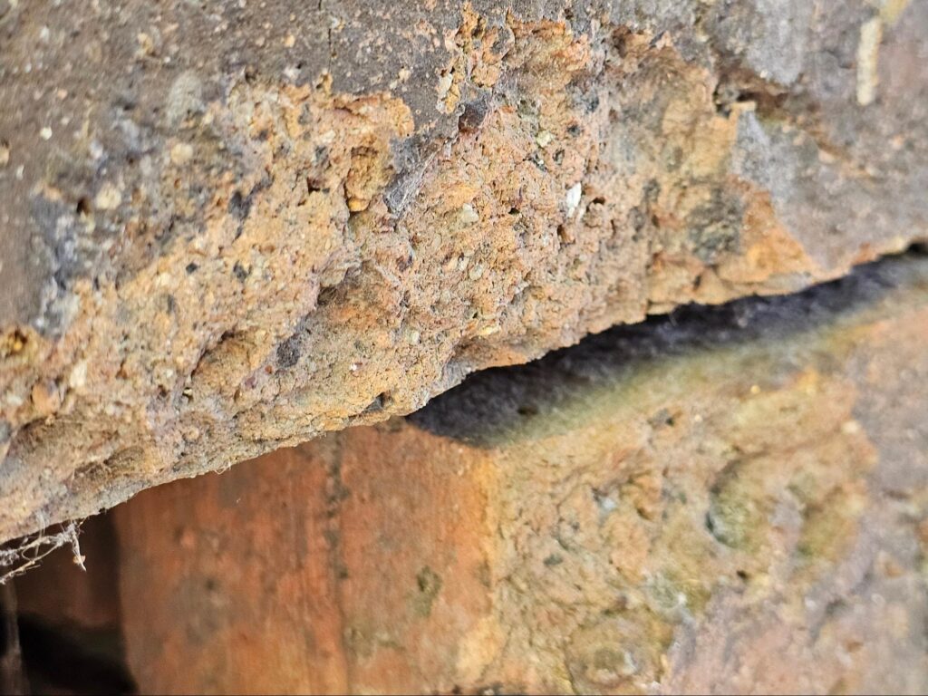 weep installation and brick spalling