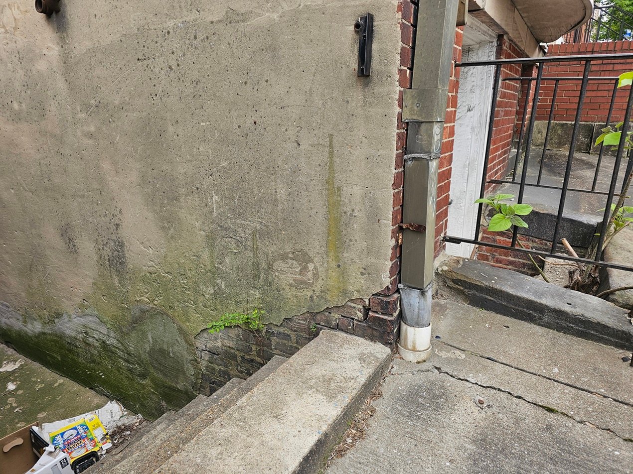 Base Wall Deterioration at A Stairway