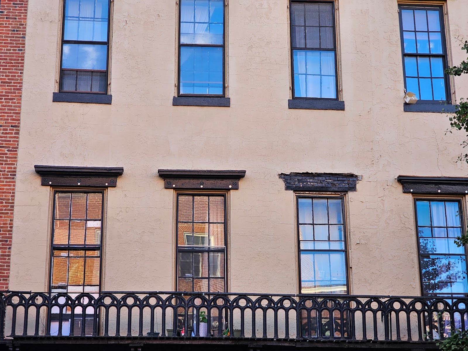 Masonry Behind a Doric Window Entablature