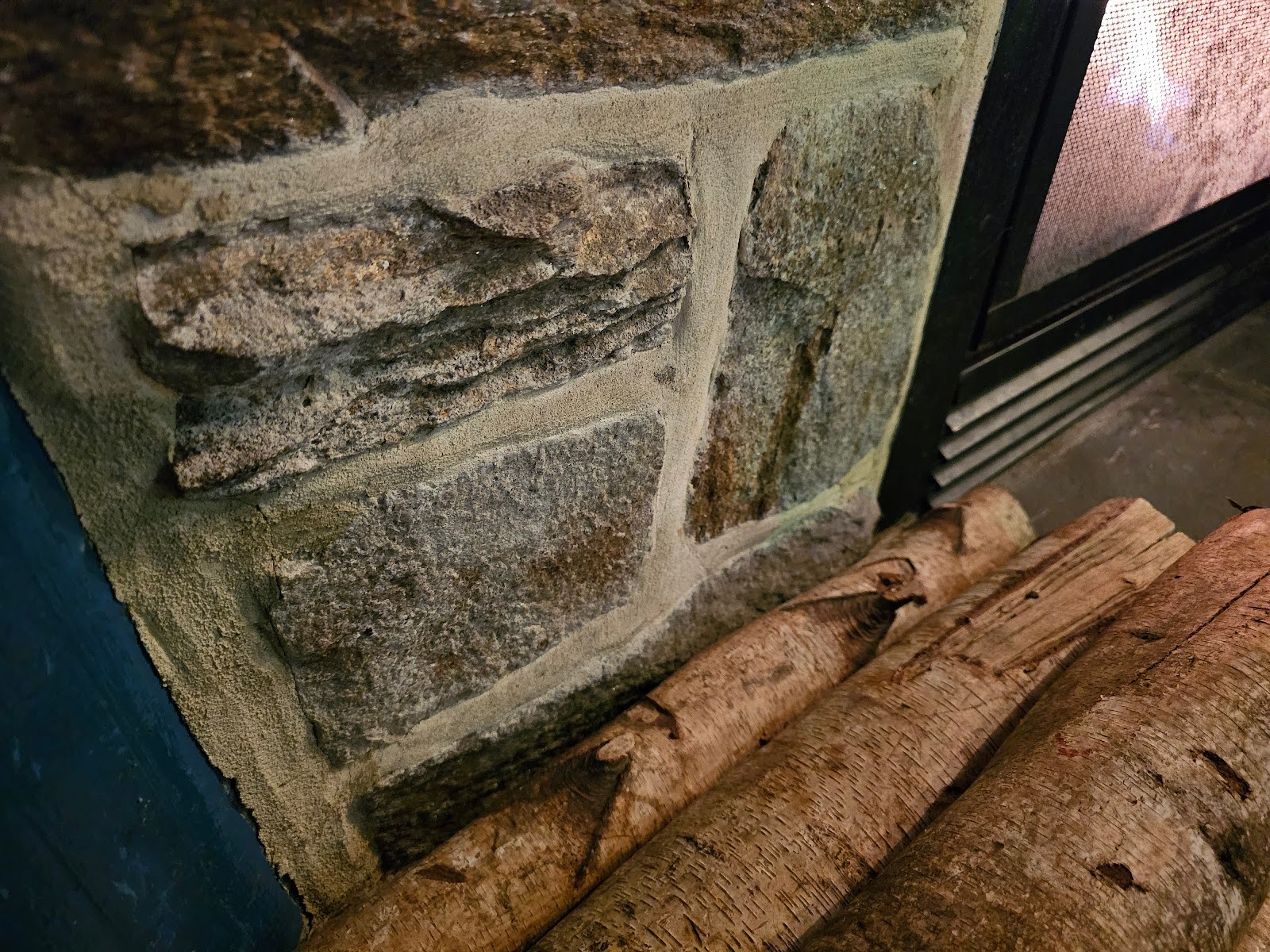 same granite stone used at ththe historic knick knacks and trinketse surround of the gas logs insert