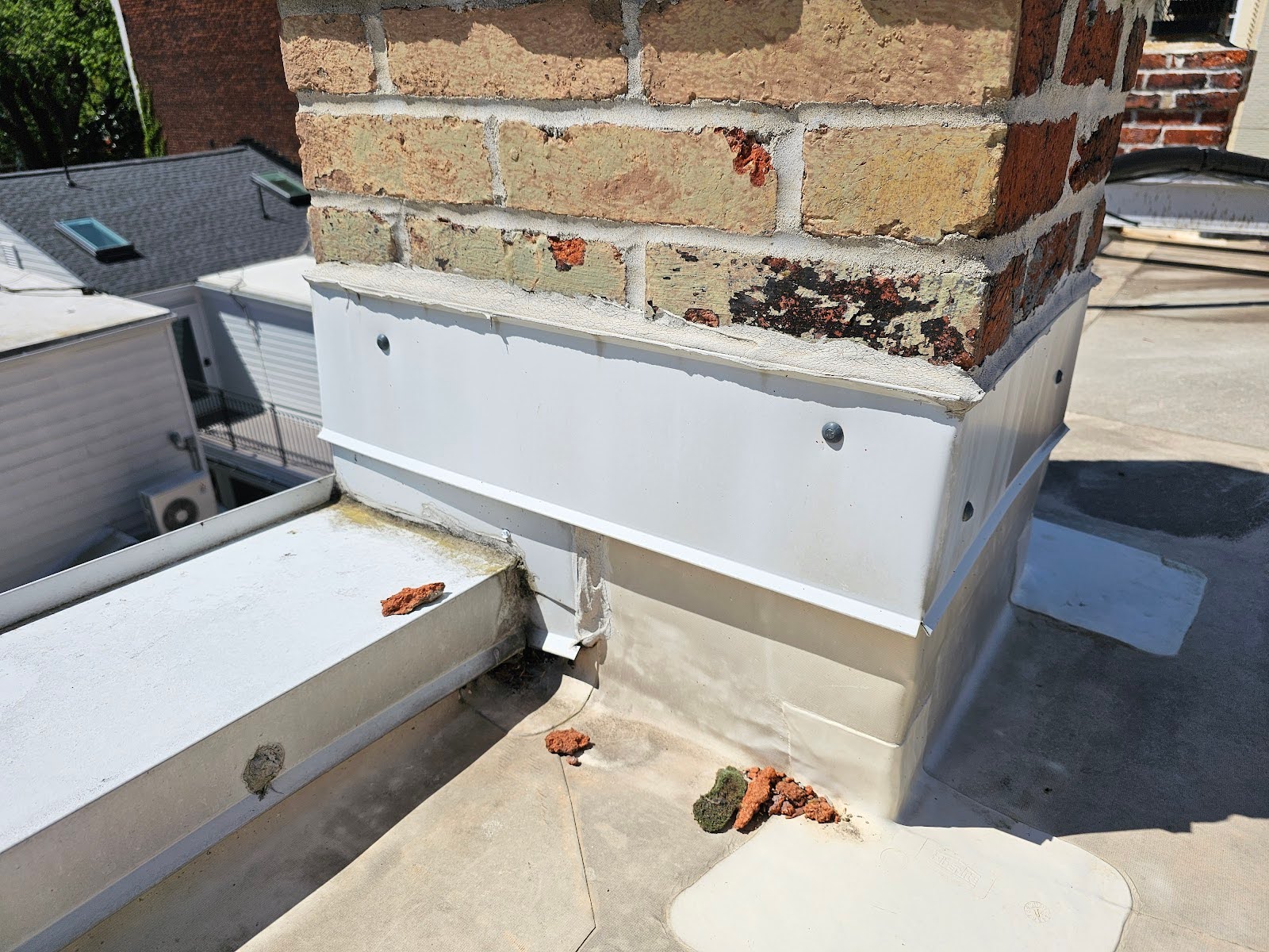the base of the chimney where the chimney penetrates