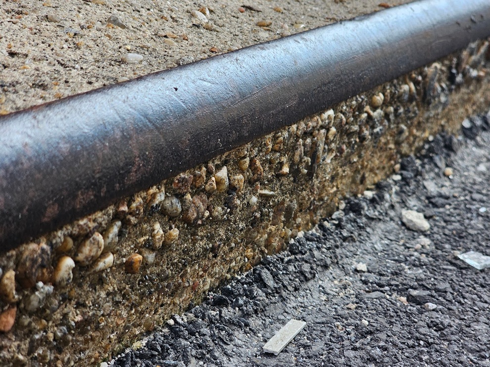 concrete curb and the steel nosing