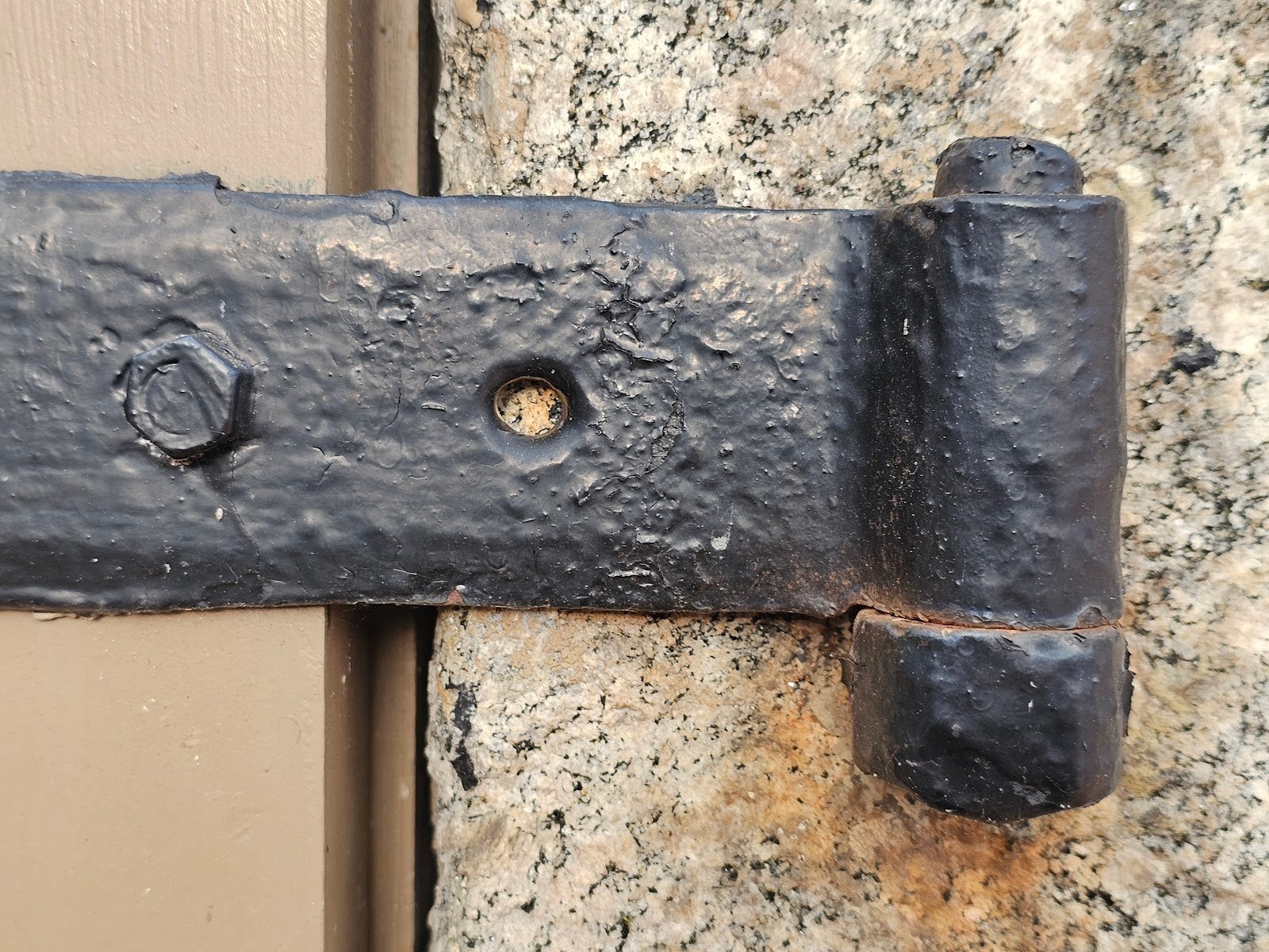 Rustic strap hinges on masonry buildings Washington DC