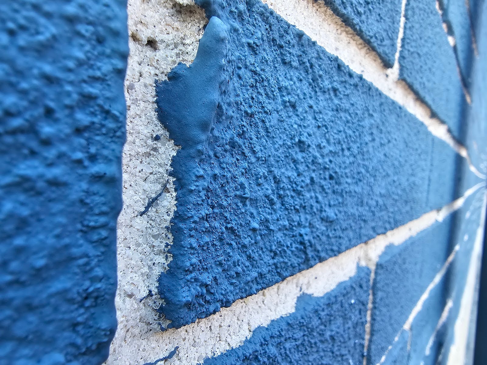 Close-up of Painted Brick Faces highlighting surface finish and joint pattern