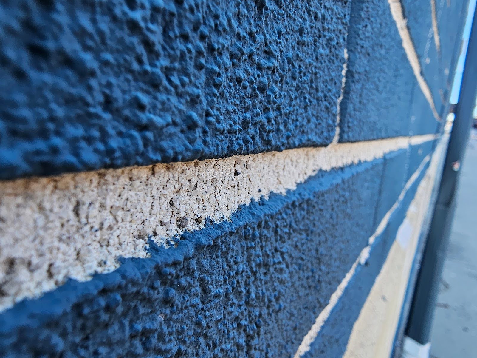 Modern building design featuring Painted Brick Faces and contrasting mortar