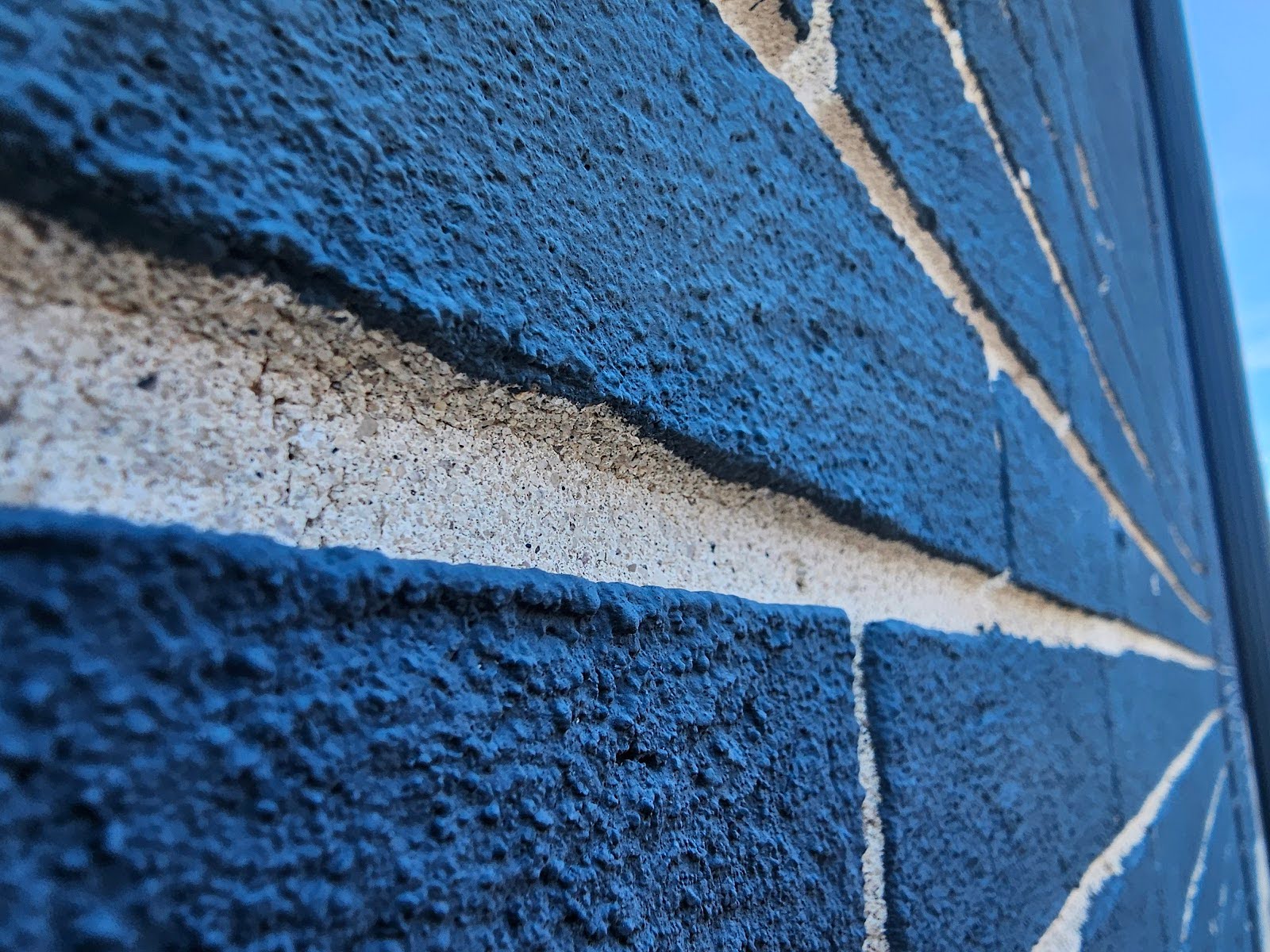 Restored façade highlighting Painted Brick Faces with clean mortar joints