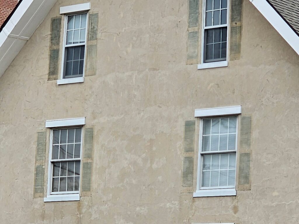 top of historic brick walls as a method of avoiding repointing