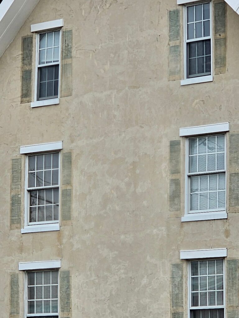 vinyl siding - aesthetic - exposed masonry