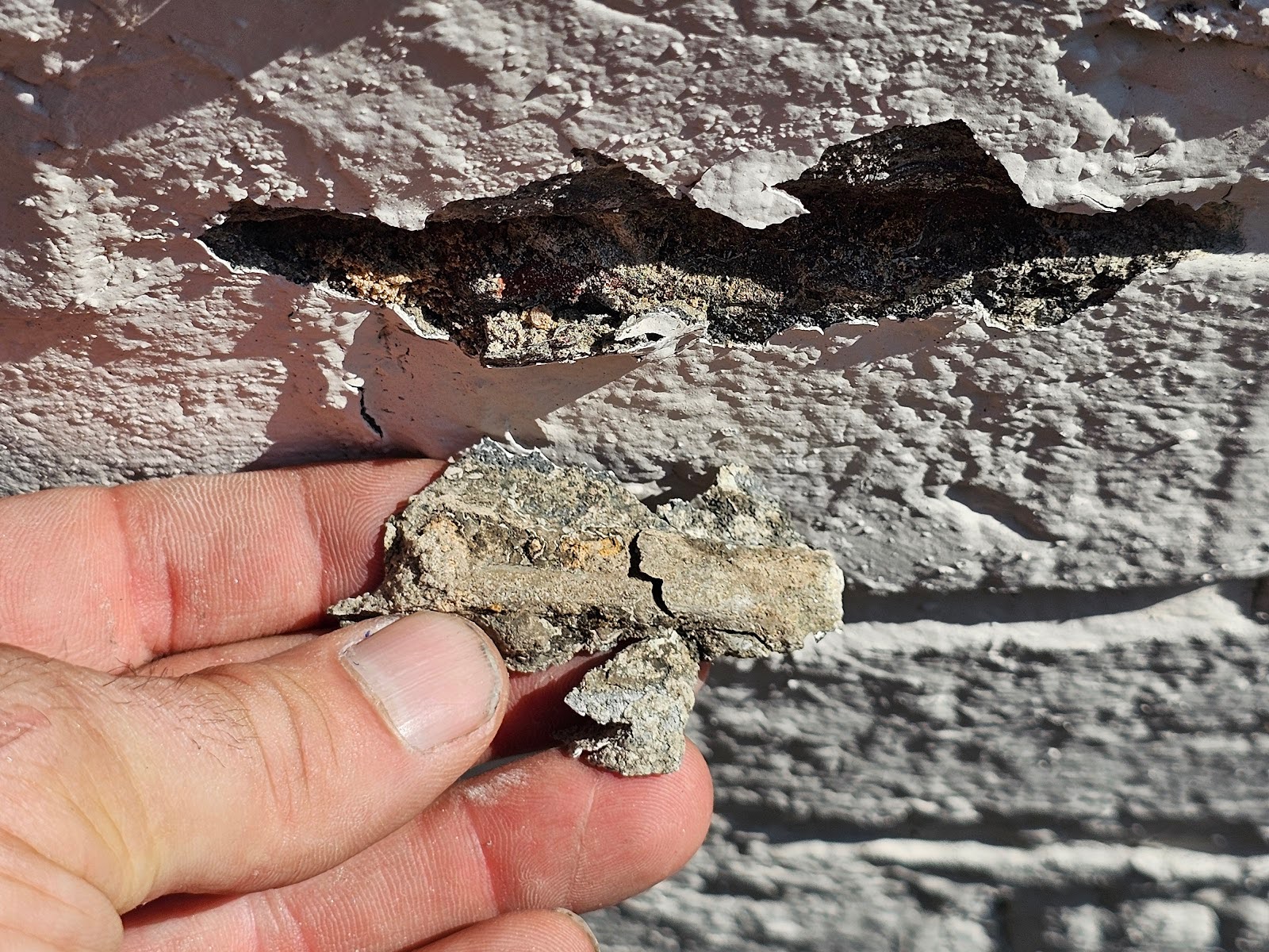 Chunk of mortar came right out of the wall