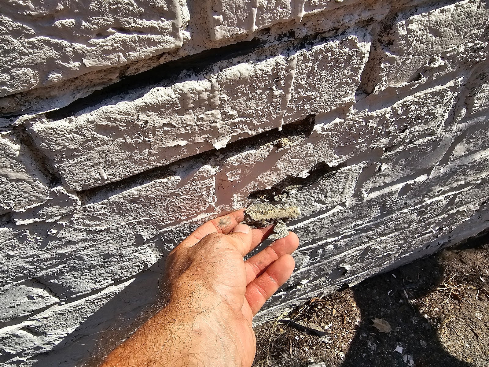 repointing the entirety of this particular facade