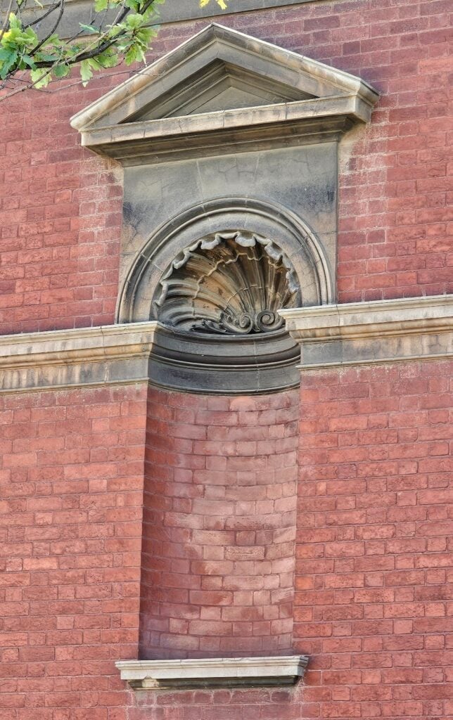 Statuary niches in historic masonry walls showcasing architectural detail