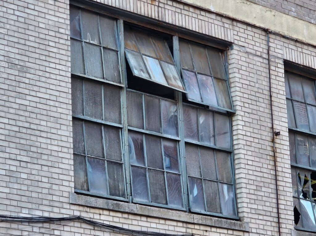 Custom Industrial Fenestration for Masonry Restoration Project - Industrial Fenestration in Historic Brick Wall Openings