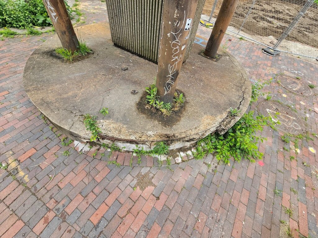 Overhydrated concrete surface displaying signs of material breakdown and deterioration