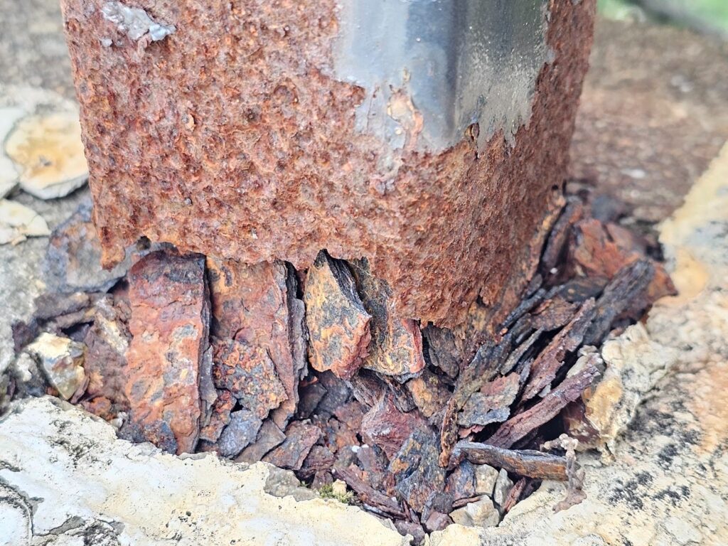 Close-up of steel embeds in masonry and concrete structure