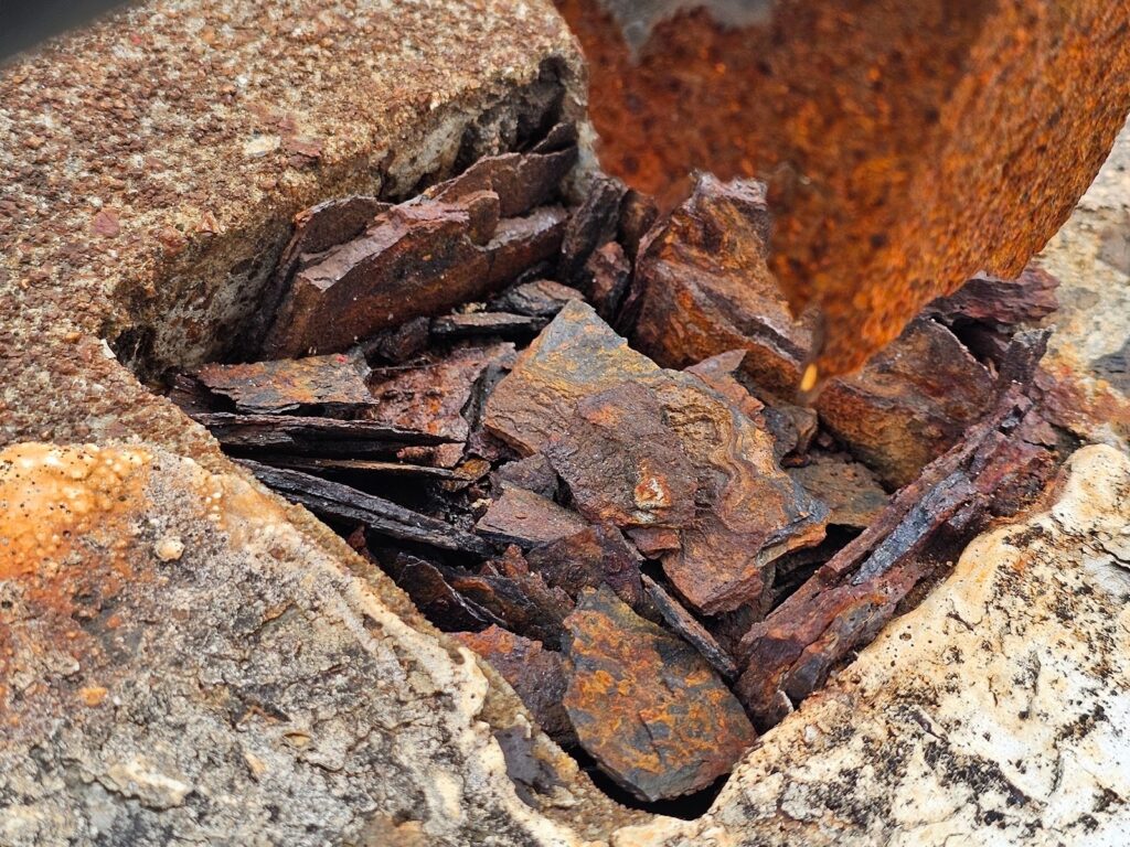 Detailed view of steel embeds integrated into masonry and concrete