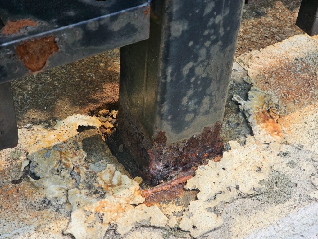 Steel embed connections within masonry and concrete