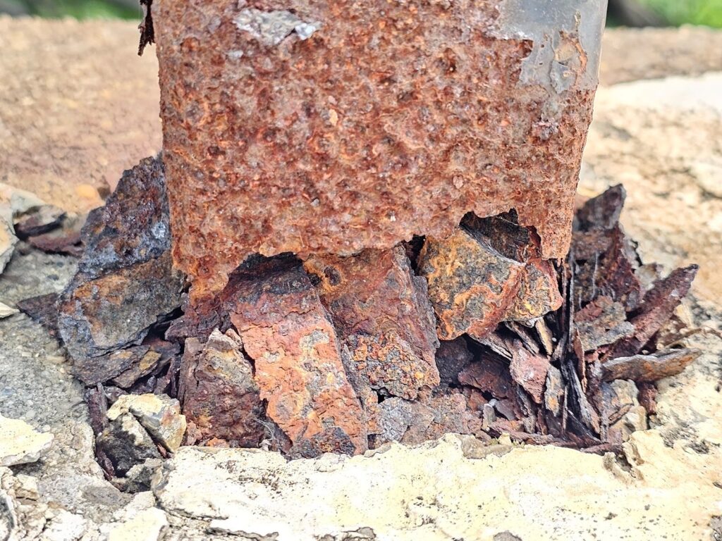 Steel reinforcement embeds connecting masonry and concrete